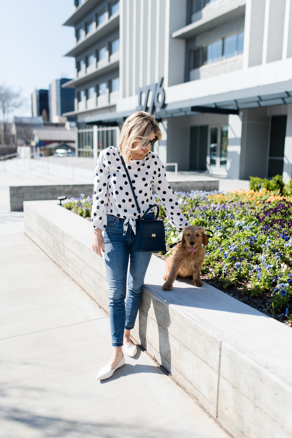 spring outfit polka dot blouse and white flats