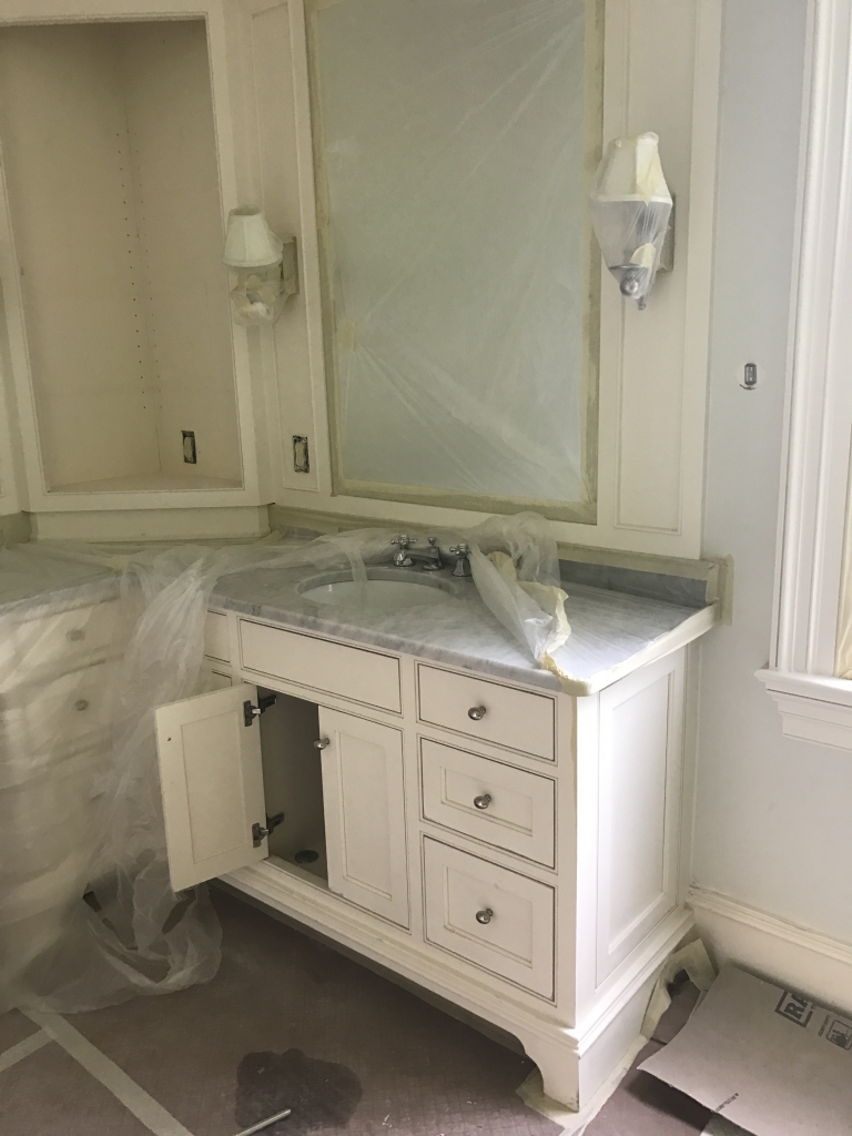 White Master Bathroom Renovation